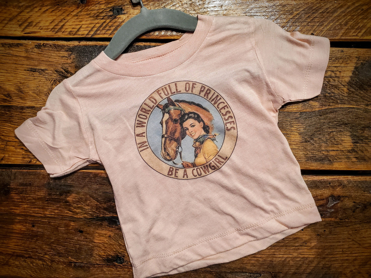 In A World of Princesses, Be A Cowgirl - Premium Extra Soft Vintage Western Tee Shirt - Pick Your Color - Baby, Toddler, Youth, Adult Sizes