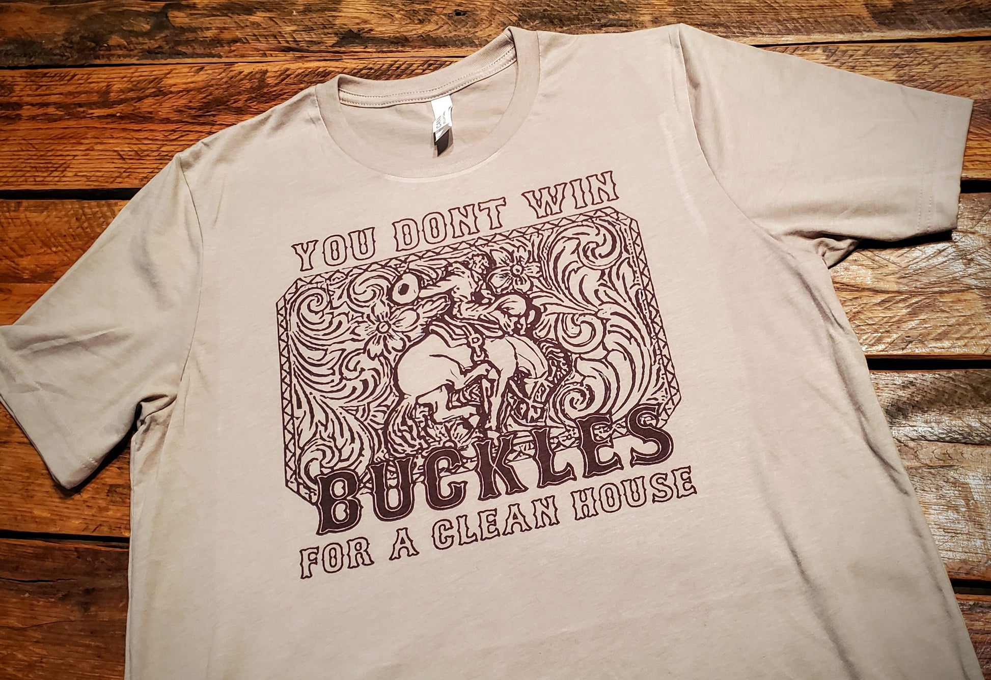 You Don't Win Buckles For A Clean House - Premium Extra Soft Vintage Western Tee Shirt - Pick Your Color - Baby, Toddler, Youth, Adult Sizes