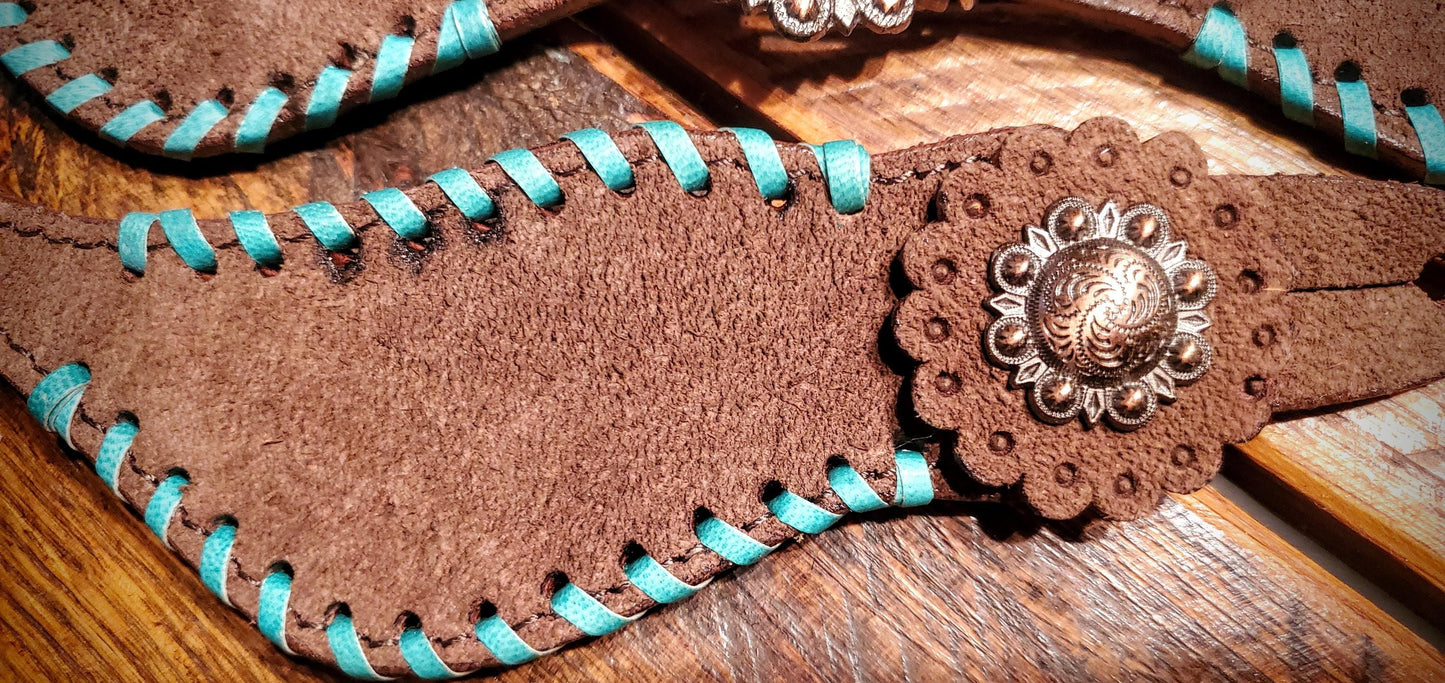 Chocolate Roughout Leather Spur Straps with Turquoise Whip Stitch Lacing and Engraved Copper Buckles & Conchos